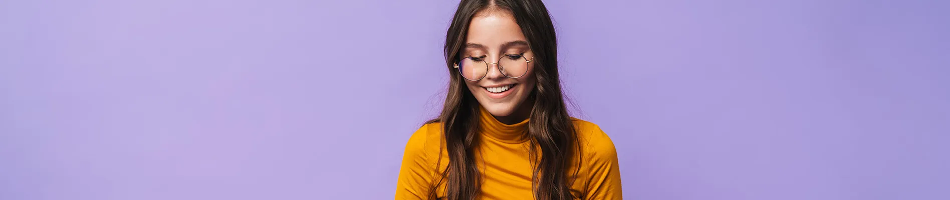 A person typing on a laptop in a sleek and modern office - perfect for corporate work