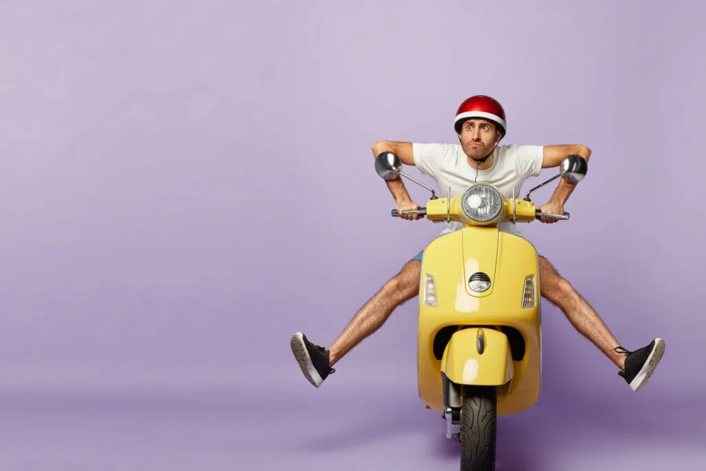 a man on a motorcycle with Ignition Marketing brand colours