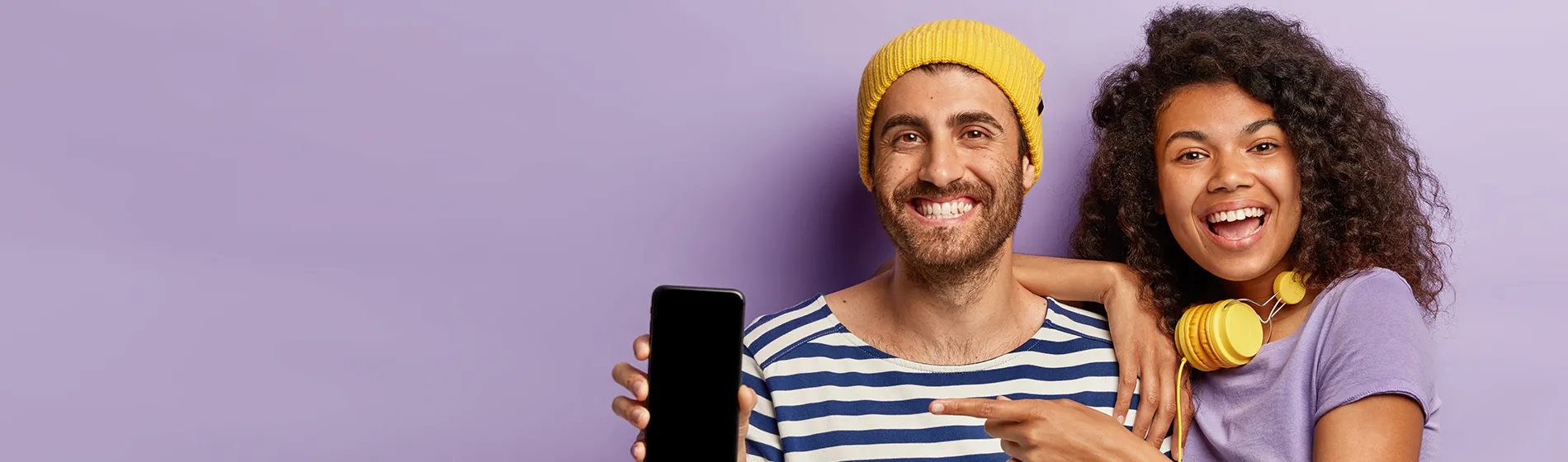 A man and women holding Ignition Marketing corporate gifts