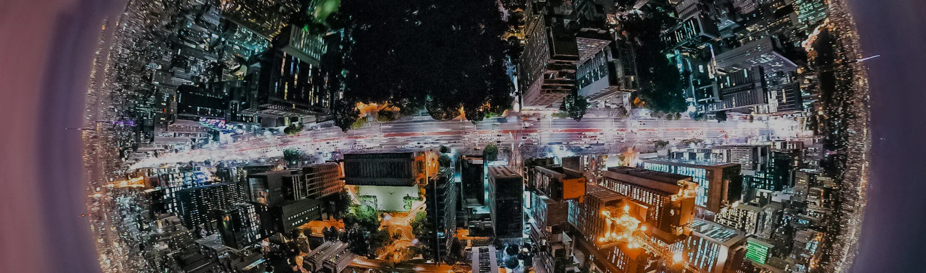 A hero image of a city centre at night