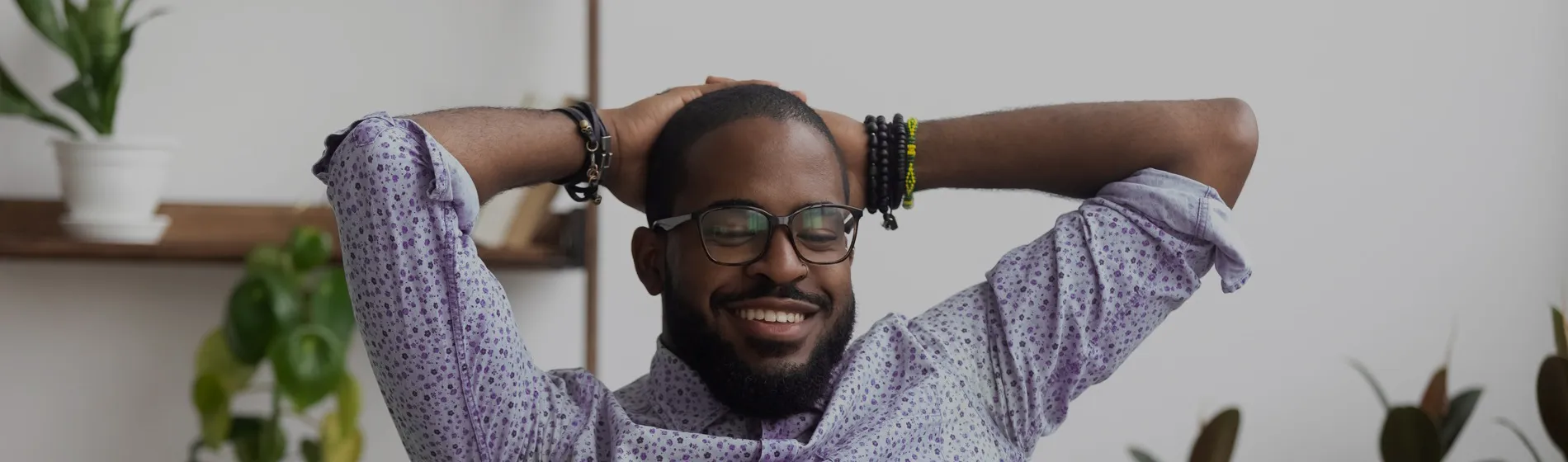 A hero image of a man smiling because of corporate gifts from Ignition Marketing